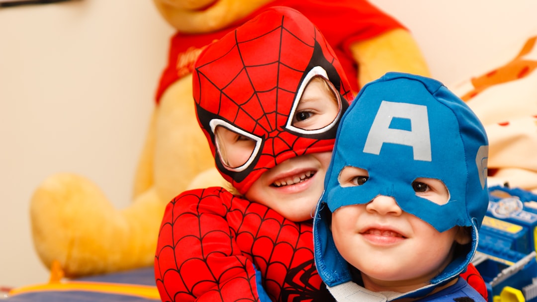 ❓ FAQ: Your Burning Questions About PBS Kids Go Answered by Learning Game kids in spiderman and Captain America costumes