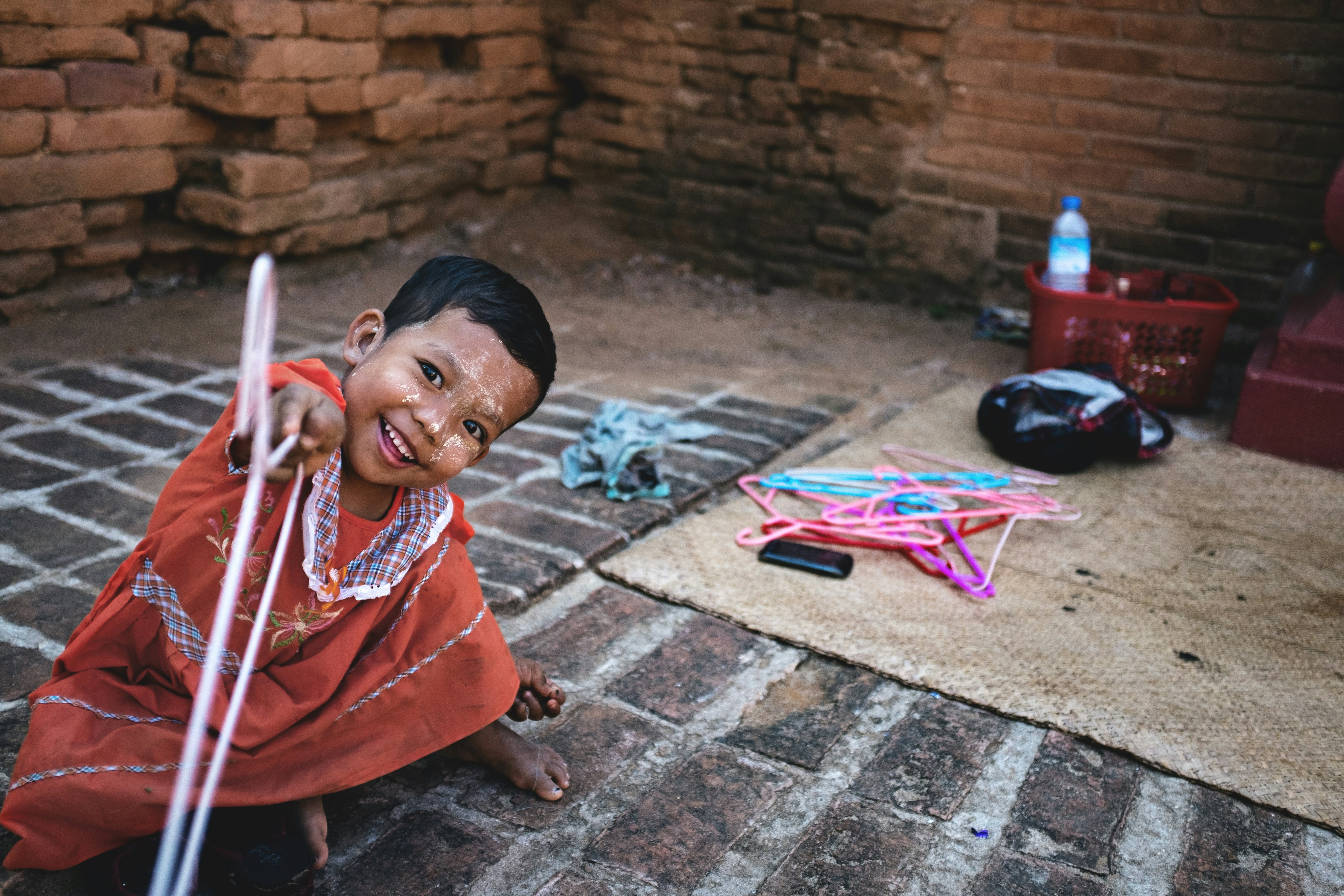 boy near red basket